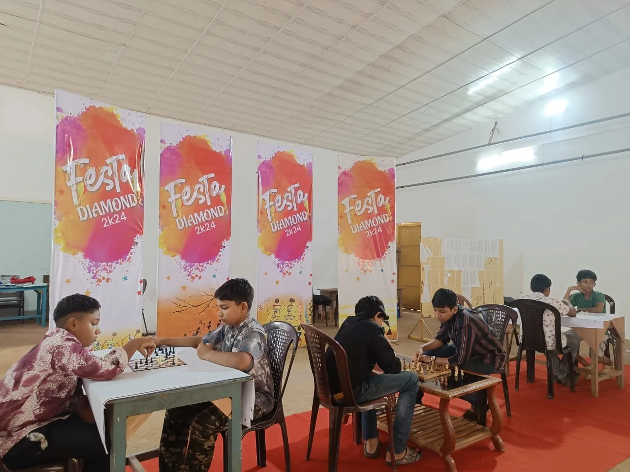 Students playing chess at school